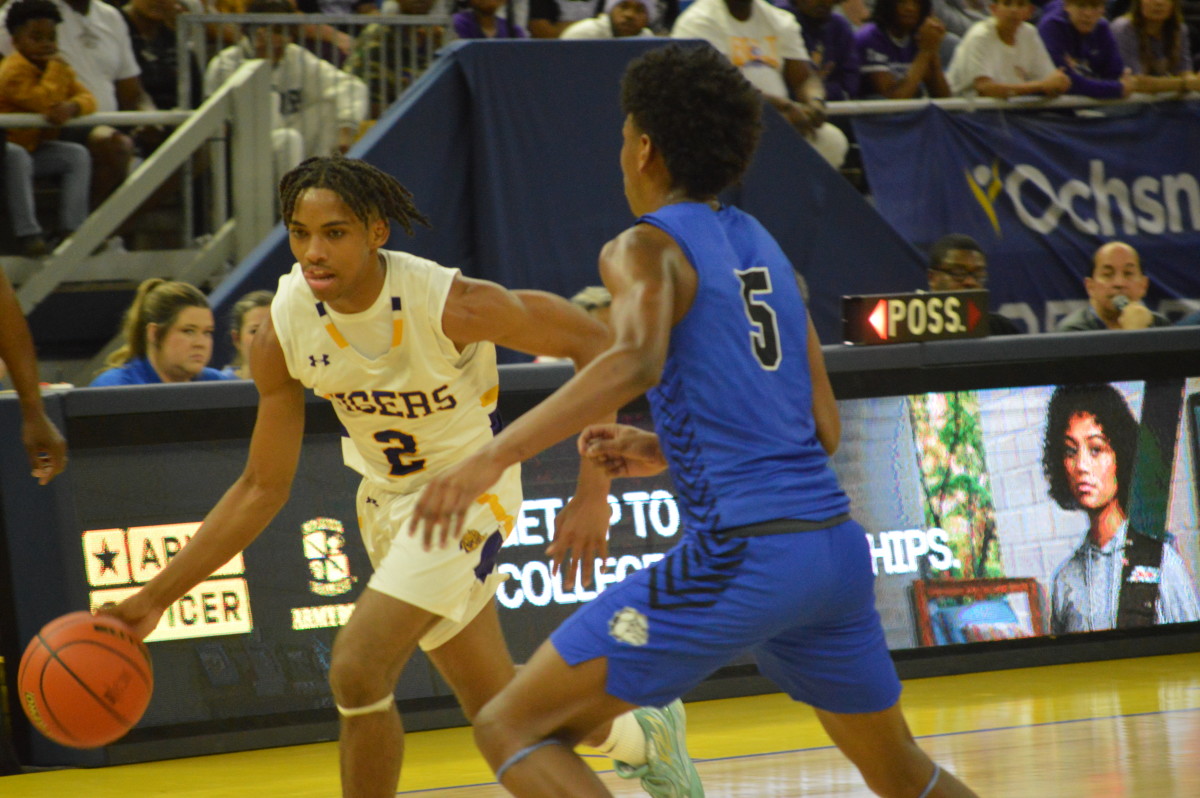 Marksville freshman Devin Lavalais (2) tries to get inside the lane against Red River in the Division III non-select championship game March 9, 2024.